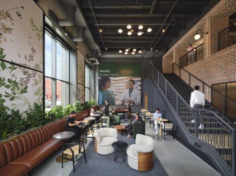 Двусветная лаунж зона с лестницей Opella Offices