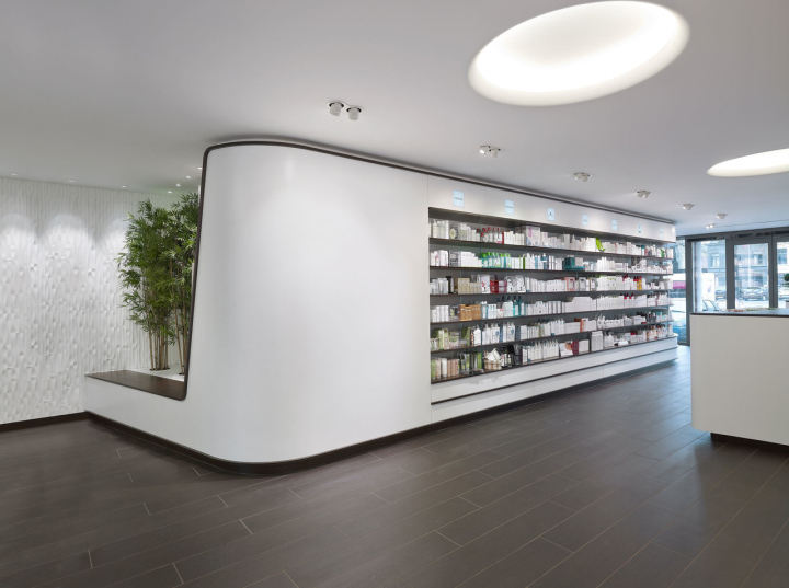 Белый дизайн аптеки Sint-Lievens-Houtem в Бельгии
