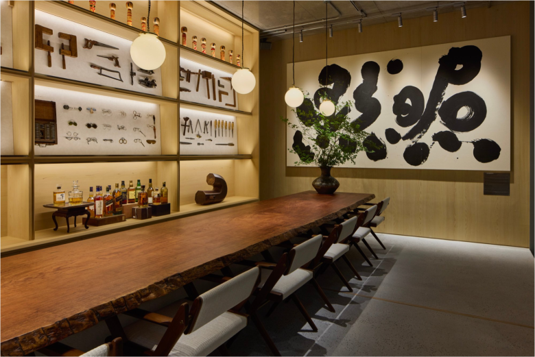 длинный деревянный стол и шкаф Jacques Marie Mage Store