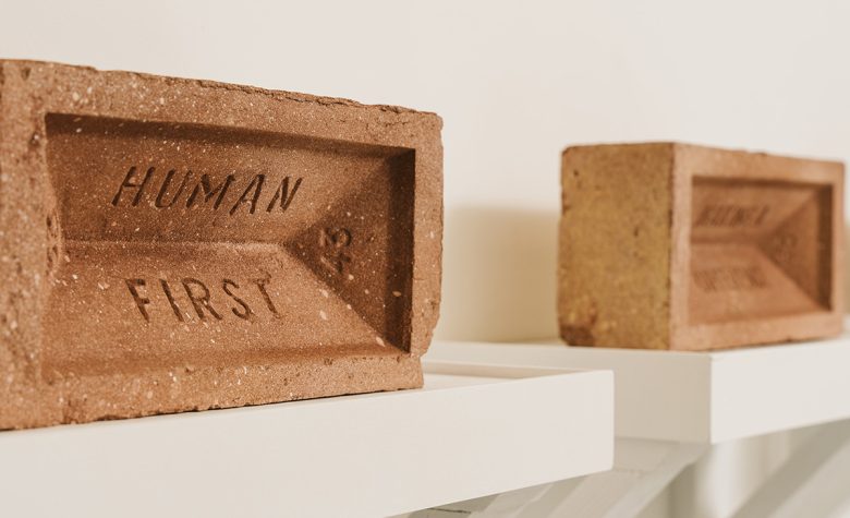 глиняные кирпичи на полках IFF Research Branding a research workspace with story