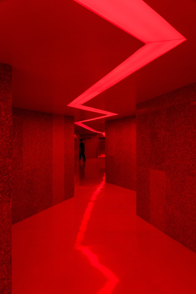 коридор с красным освещением Space Available Jakarta Community Center