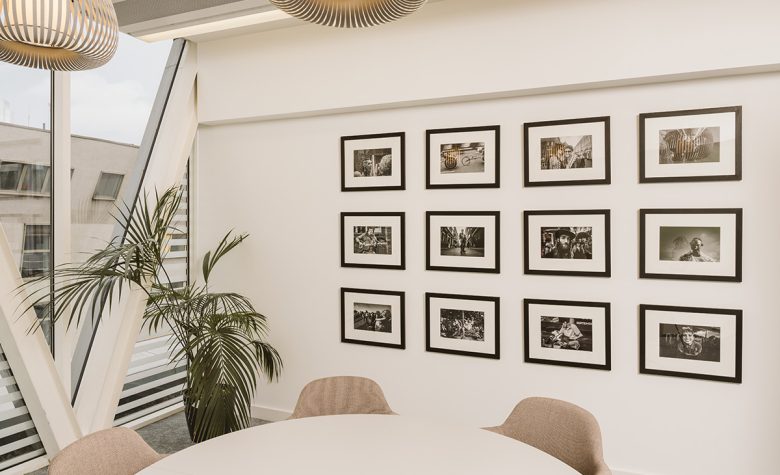 стена с картинами IFF Research Branding a research workspace with story