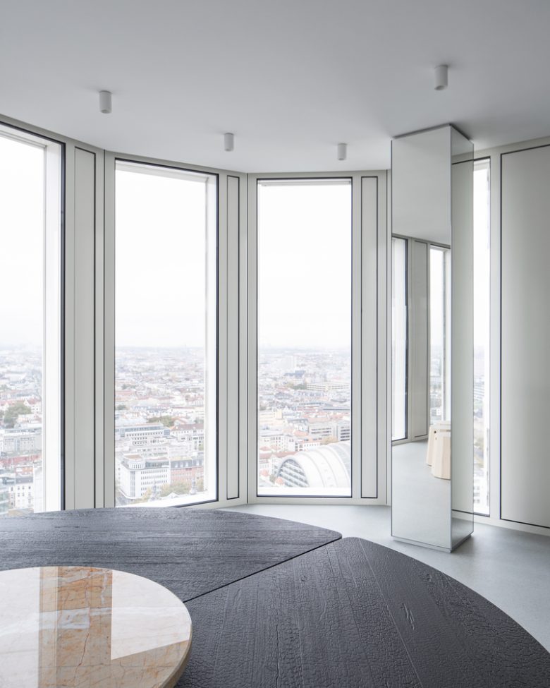 вид на город из окна Signa Sports United High‑Rise Tower