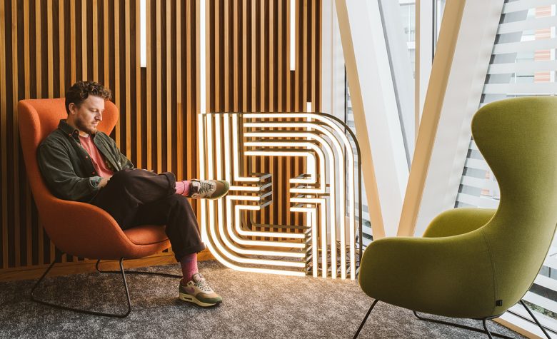 зона отдыха с креслами IFF Research Branding a research workspace with story